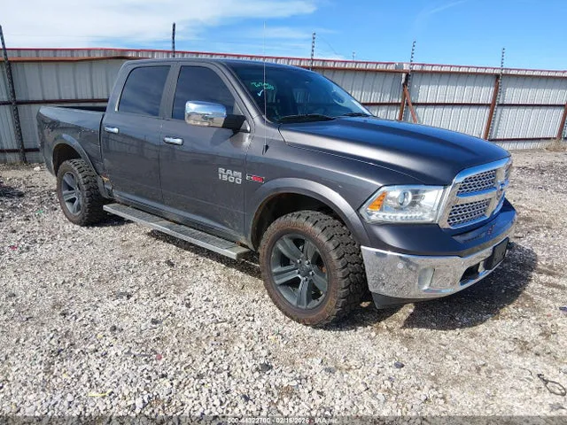2018 RAM 1500 Laramie 4x4 5'7 Box VIN 1C6RR7NM2JS257594 фото 1