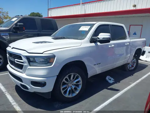 2023 RAM 1500 Laramie 4x4 5'7 Box VIN 1C6SRFJT2PN631234 фото 2