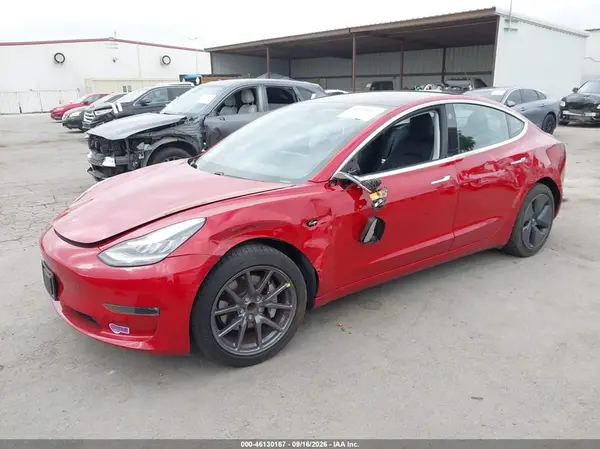 5YJ3E1EA6JF058543 — 2018 Tesla Model 3, фото 2 с аукциона IAAI 14.10.2026, Левый бок