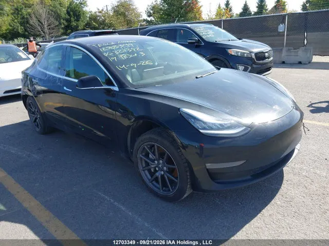 2019 Tesla MODEL 3 VIN 5YJ3E1EAXKF321392 фото 1