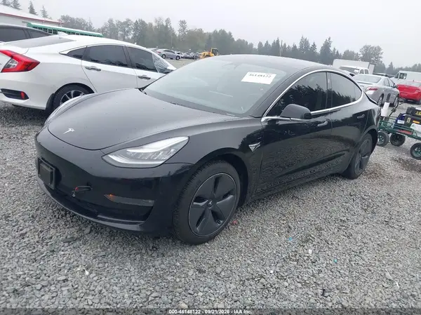 5YJ3E1EA7KF395854 — 2019 Tesla Model 3, фото 2 с аукциона IAAI 09.10.2026, Задняя часть