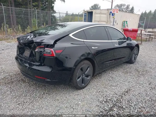 5YJ3E1EA7KF395854 — 2019 Tesla Model 3, фото 4 с аукциона IAAI 09.10.2026, Задняя часть