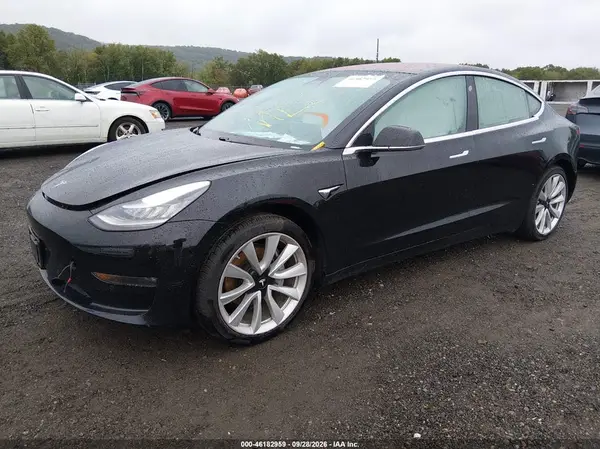 5YJ3E1EB8KF192576 — 2019 Tesla Model 3, фото 2 с аукциона IAAI 09.10.2026, Подтопление