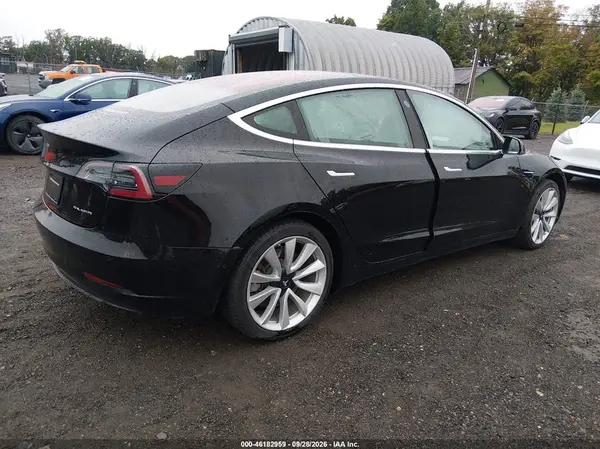 5YJ3E1EB8KF192576 — 2019 Tesla Model 3, фото 4 с аукциона IAAI 09.10.2026, Подтопление