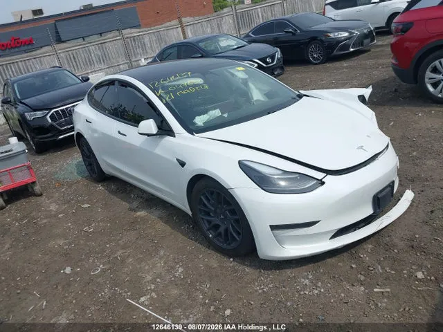 2021 Tesla MODEL 3 VIN 5YJ3E1EAXMF047632 фото 1