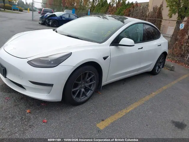 5YJ3E1EA1NF174335 — 2022 Tesla Model 3, фото 2 с аукциона IAAI 14.10.2026, Левый бок