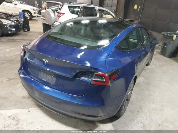 5YJ3E1EA4NF348737 — 2022 Tesla Model 3, фото 4 с аукциона IAAI 13.10.2026, Подтопление