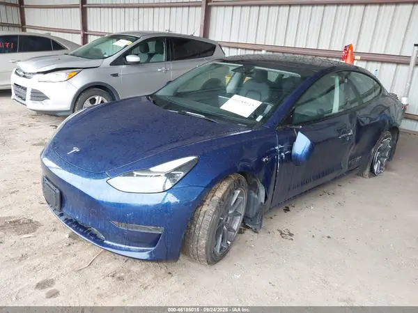 5YJ3E1EB0NF145403 — 2022 Tesla Model 3, фото 2 с аукциона IAAI, Левый бок