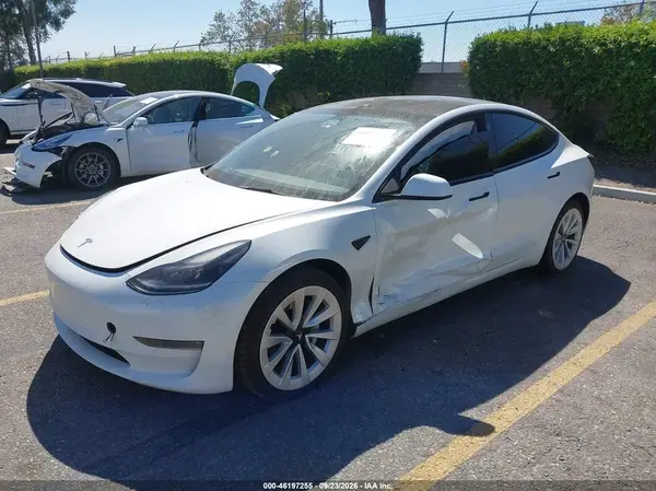 5YJ3E1EB8NF274716 — 2022 Tesla Model 3, фото 2 с аукциона IAAI, Левый бок