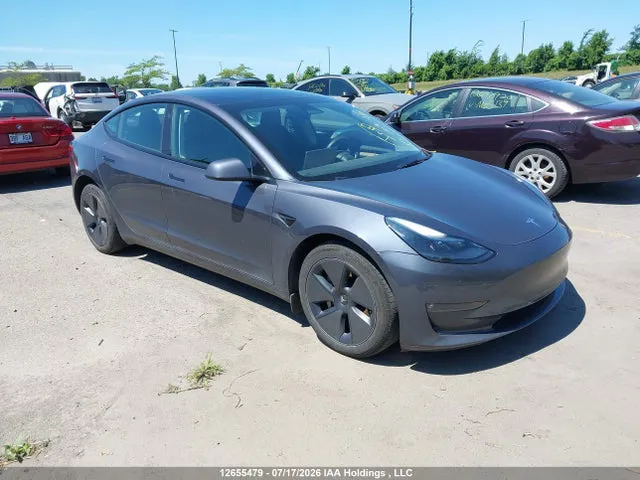 2023 Tesla MODEL 3 VIN LRW3E1EB2PC943186 фото 1