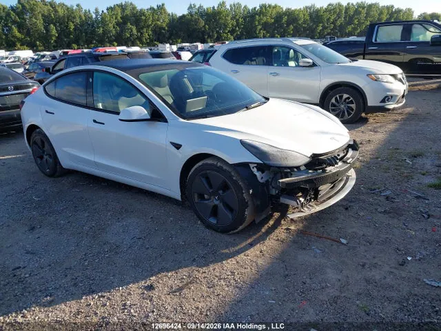 2023 Tesla MODEL 3 VIN LRW3E1FA9PC876060 фото 1