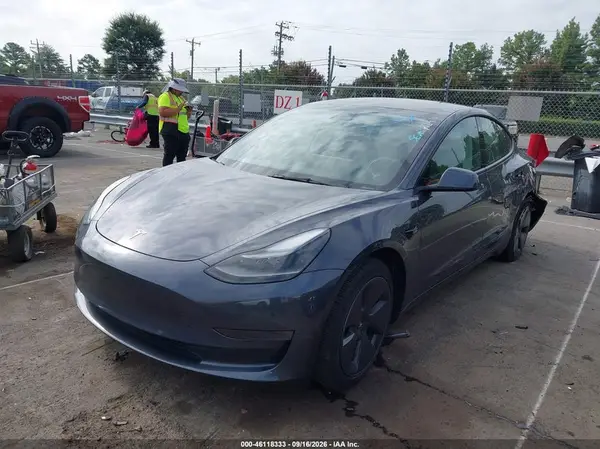 5YJ3E1EA1PF692237 — 2023 Tesla Model 3, фото 2 с аукциона IAAI 12.10.2026, Левый бок