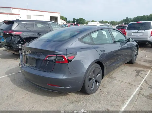 5YJ3E1EA1PF692237 — 2023 Tesla Model 3, фото 4 с аукциона IAAI 12.10.2026, Левый бок