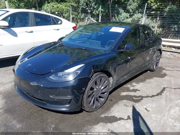 5YJ3E1EC9PF594929 — 2023 Tesla Model 3, фото 2 с аукциона IAAI, Левый бок