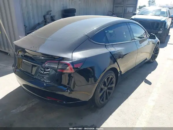 5YJ3E1EAXPF459215 — 2023 Tesla Model 3, фото 4 с аукциона IAAI, Левый бок