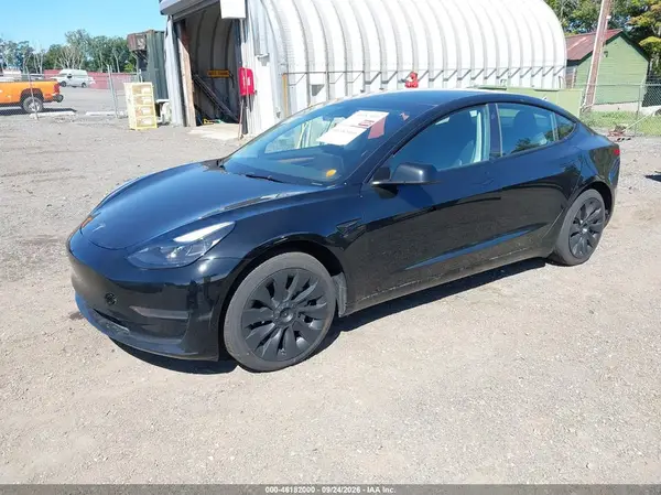 5YJ3E1EA5PF640402 — 2023 Tesla Model 3, фото 2 с аукциона IAAI 08.10.2026, Подтопление