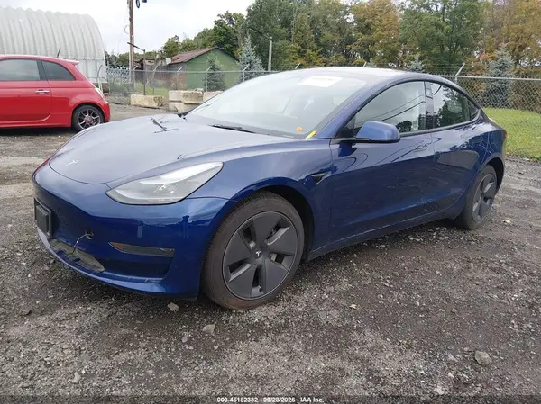 5YJ3E1EA2PF653477 — 2023 Tesla Model 3, фото 2 с аукциона IAAI, Подтопление