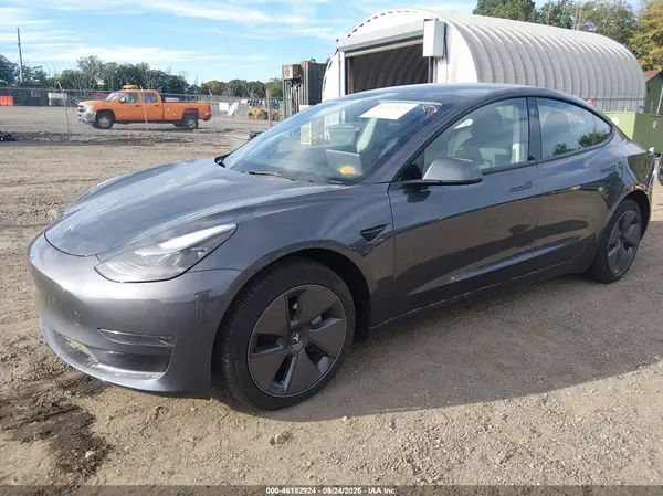 5YJ3E1EA0PF642381 — 2023 Tesla Model 3, фото 2 с аукциона IAAI, Подтопление