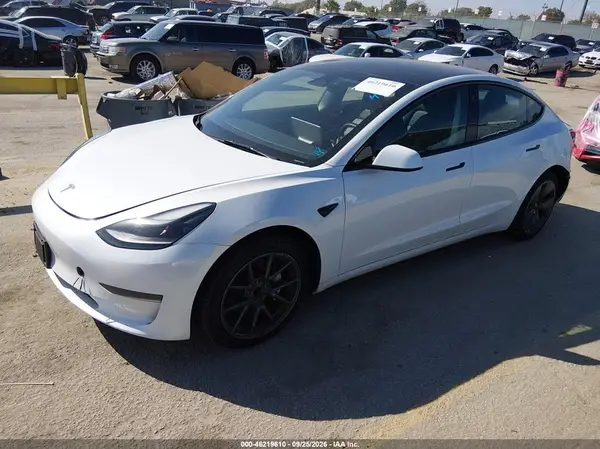 5YJ3E1EA3PF543697 — 2023 Tesla Model 3, фото 2 с аукциона IAAI, Задняя часть