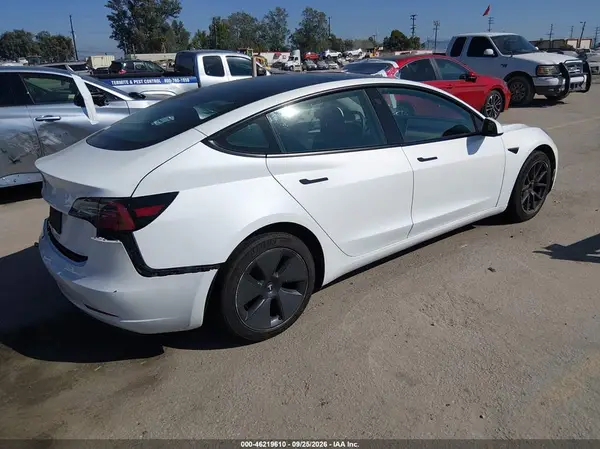 5YJ3E1EA3PF543697 — 2023 Tesla Model 3, фото 4 с аукциона IAAI, Задняя часть