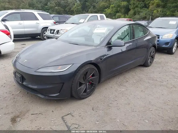 5YJ3E1ET1RF858289 — 2024 Tesla Model 3, фото 2 с аукциона IAAI, Задняя часть
