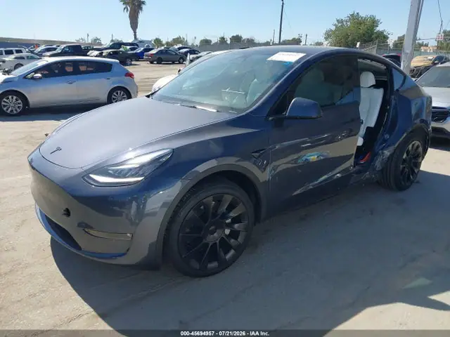 7SAYGDEE5PF605673 — 2023 Tesla Model Y AWD/Long Range Dual Motor ALL-Wheel Drive, фото 2 с аукциона IAAI 30.09.2026, Левый бок