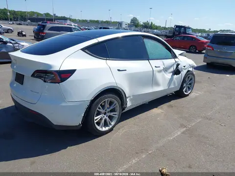 2023 Tesla Model Y Awd/long Range Dual Motor All-wheel Drive VIN 7SAYGDEE5PA060894 фото 4
