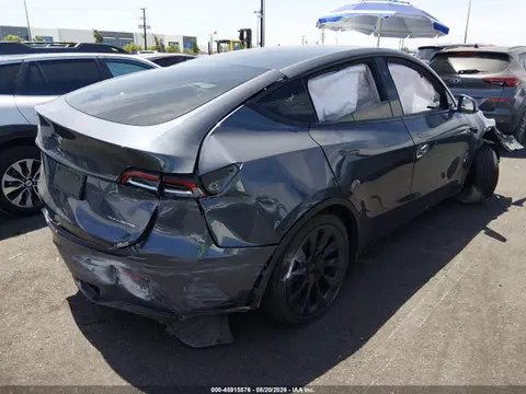 2023 Tesla Model Y Awd/long Range Dual Motor All-wheel Drive VIN 7SAYGAEE2PF829580 фото 4