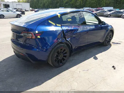 2023 Tesla Model Y Awd/long Range Dual Motor All-wheel Drive VIN 7SAYGDEEXPA074869 фото 4