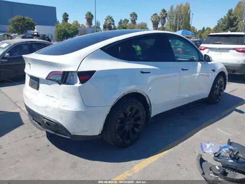 2023 Tesla Model Y Awd/long Range Dual Motor All-wheel Drive VIN 7SAYGDEE8PF676155 фото 4
