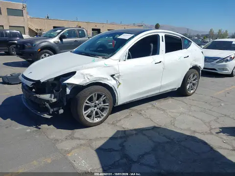 2023 Tesla Model Y Awd/long Range Dual Motor All-wheel Drive VIN 7SAYGDEE4PF663175 фото 2