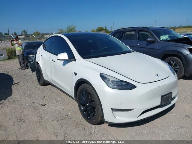 2021 Tesla Model Y Long Range VIN 5YJYGDEE8MF257621 фото 1