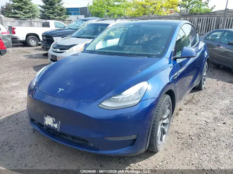 2022 Tesla Model Y Long Range VIN 7SAYGAEEXNF575839 фото 2