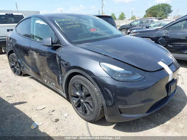 2024 Tesla Model Y Long Range VIN 7SAYGDEEXRF204333 фото 1
