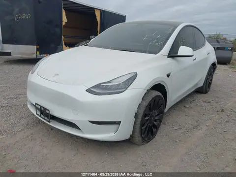 2023 Tesla Model Y VIN 7SAYGAEE8PF590701 фото 2