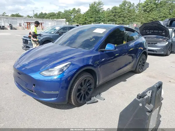 7SAYGDEE6PA168506 — 2023 Tesla Model Y, фото 2 с аукциона IAAI, Подтопление