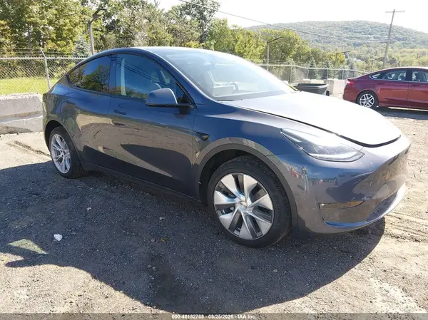 7SAYGDEE9PF862416 — 2023 Tesla Model Y, Подтопление (Flood), фото до ремонта