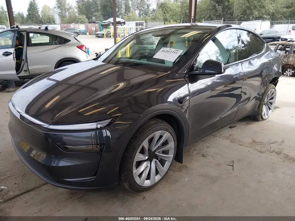 7SAYGDEE3TF561862 — 2026 Tesla Model Y, фото 2 с аукциона IAAI, Задняя часть слева
