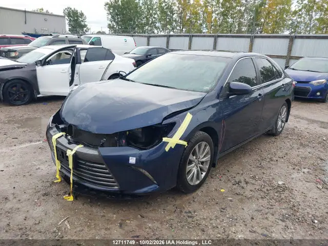 4T1BF1FK8FU978068 — 2015 Toyota Camry XLE, фото 2 с аукциона IAAI 13.10.2026, Передняя часть