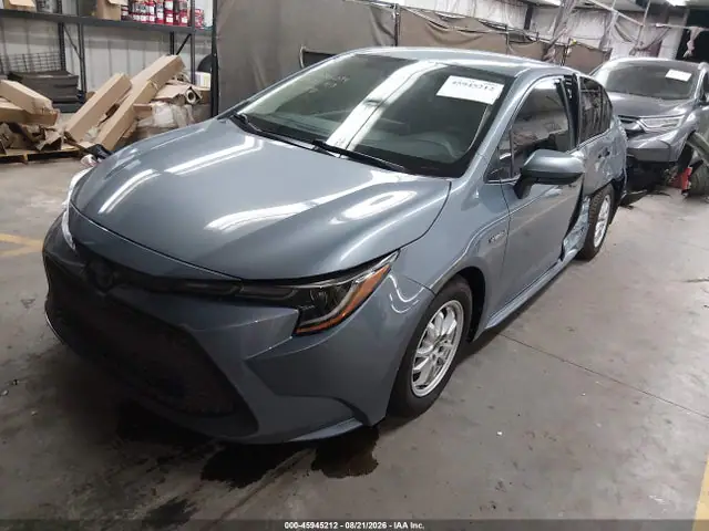 JTDEAMDE3MJ018430 — 2021 Toyota Corolla Hybrid LE, фото 2 с аукциона IAAI 06.10.2026, Левый бок