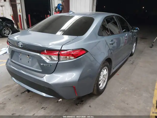 JTDEAMDE3MJ018430 — 2021 Toyota Corolla Hybrid LE, фото 4 с аукциона IAAI 06.10.2026, Левый бок