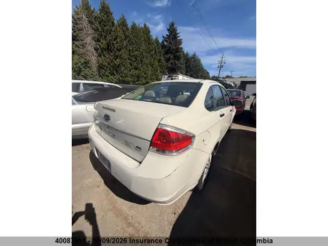 2009 Ford Focus VIN 1FAHP35N29W204156 фото 4