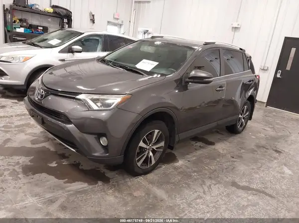 2T3RFREV9GW434535 — 2016 Toyota RAV4, фото 2 с аукциона IAAI, Левый бок