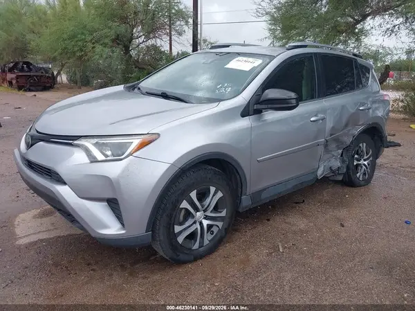 JTMZFREV5JJ171563 — 2018 Toyota RAV4, фото 2 с аукциона IAAI, Левый бок