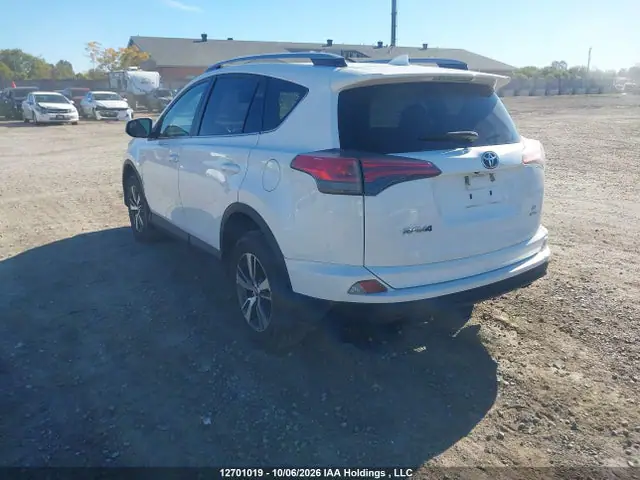 2T3BFREV9JW819635 — 2018 Toyota RAV4 LE, фото 3 с аукциона IAAI 14.10.2026, Левый бок