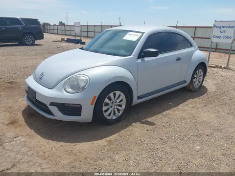 2017 Volkswagen Beetle #pinkbeetle/1.8t Classic/1.8t S VIN 3VWF17AT1HM630687 фото 2