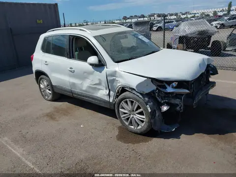 2014 Volkswagen Tiguan Sel VIN WVGAV3AX6EW601559 фото 1