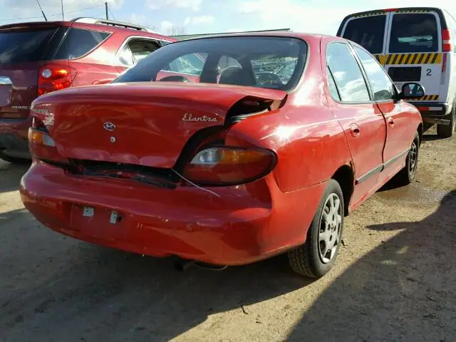 KMHJF24M0WU715823 — 1998 Hyundai Elantra, фото 4 с аукциона Аукцион 26.03.2018, Задняя часть