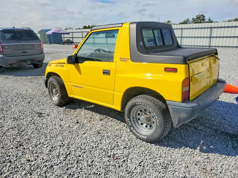 2S3TC02C9V6408637 — 1997 Suzuki Sidekick, фото 2 с аукциона Аукцион 12.10.2026, Механические повреждения